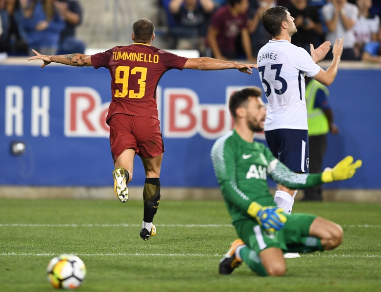 marco tumminello l of a s roma celebrates scoring as tottenham hotspur goalkeeper hugo lloris c reacts during their international champions cup icc football match on july 25 2017 at red bull arena in harrison new jersey photo afp