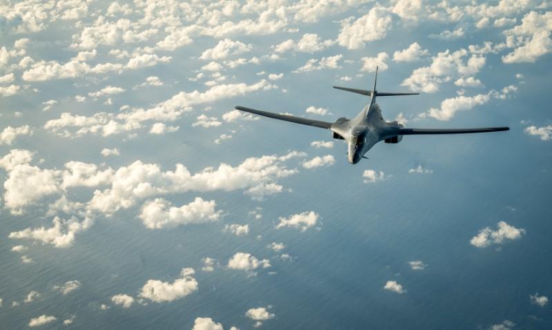 one of two u s air force b 1b lancer bombers flies a 10 hour mission from andersen air force base guam into japanese airspace and over the korean peninsula photo reuters