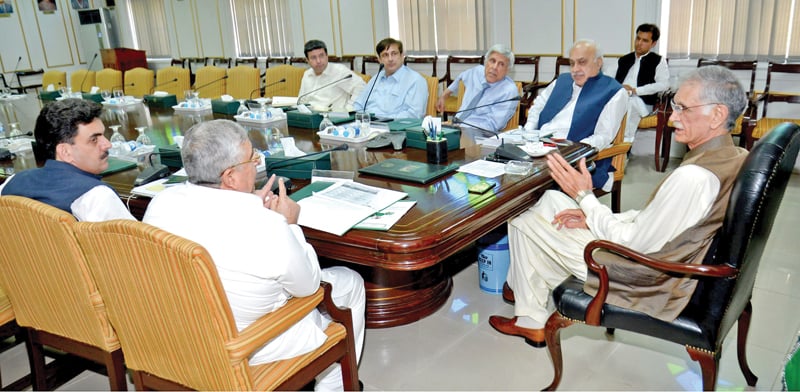 k p chief minister pervez khattak discusses extension of the sehat insaf card facility photo express