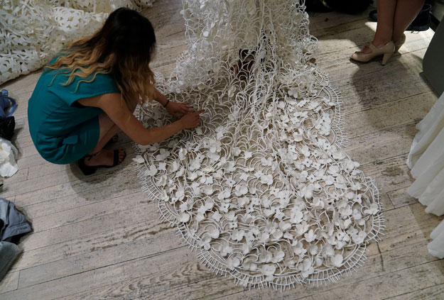 A model is pictured backstage wearing a wedding dress made out of toilet paper before a fashion show in the Manhattan borough of New York City, New York, US July 20, 2017. PHOTO: REUTERS 
