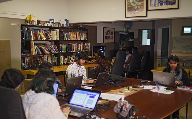 Volunteers can be seen transcribing interviews and testimonies of people who migrated from India to Pakistan at the time of partition in 1947, at their office of the Citizen Archive of Pakistan, in Karachi. PHOTO: AFP