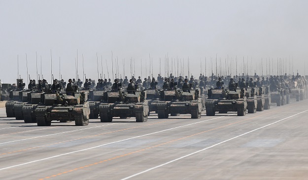 3.Chinese Type 99A tanks take part in a military parade at the Zhurihe training base in China's northern Inner Mongolia region. PHOTO: AFP