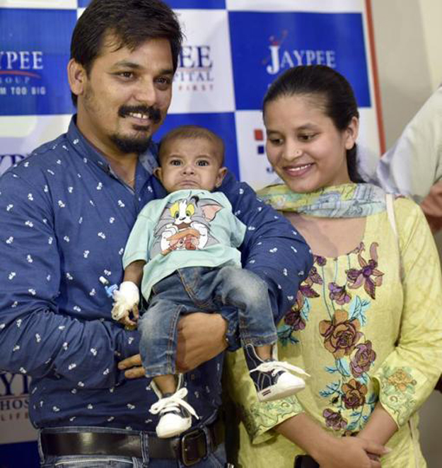 akistani couple Kanwal Siddiq and Anam with their son Rohaan. PHOTO: Hindustan Times
