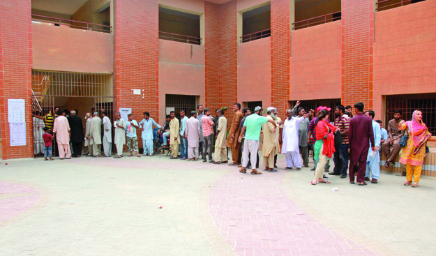 Though it started slow, the turnout at the by-election surprised even the polling officers. PHOTO: ATHAR KHAN/EXPRESS
