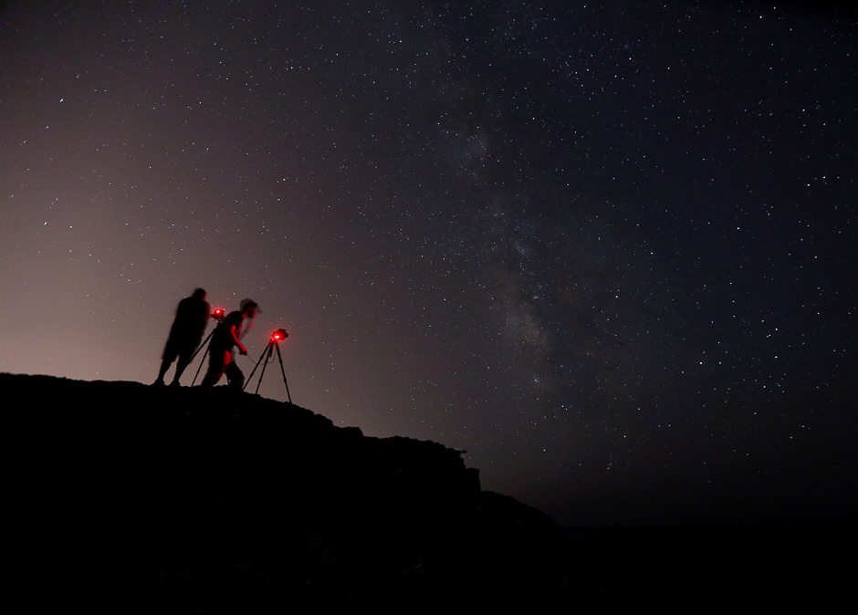Photographers take pictures of stars and the Milky Way at Rdum il-Qammieh, outside the village of Mellieha, Malta. PHOTO: REUTERS