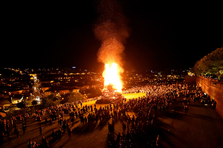 A bonfire is set alight to mark a Catholic feast day of the Assumption of the Virgin Mary in the Bogside area of Londonderry, Northern Ireland. PHOTO: REUTERS