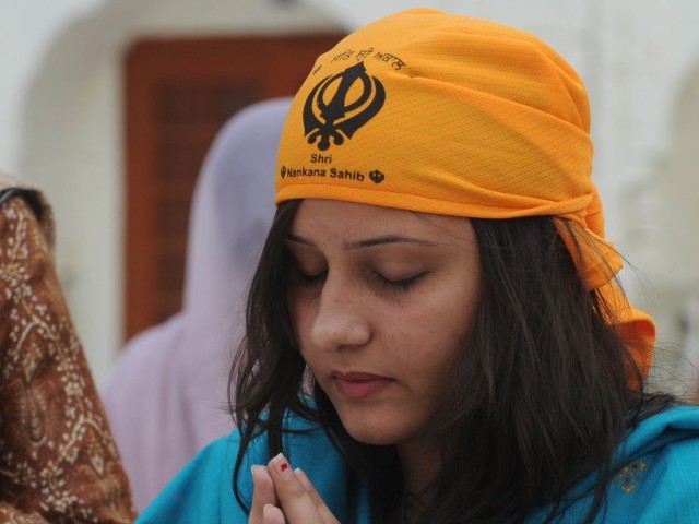In this record photo, a Sikh advocate from India prays during a 542nd birth anniversary of Guru Nanak Dev during Nankana Sahib. PHOTO: AFP