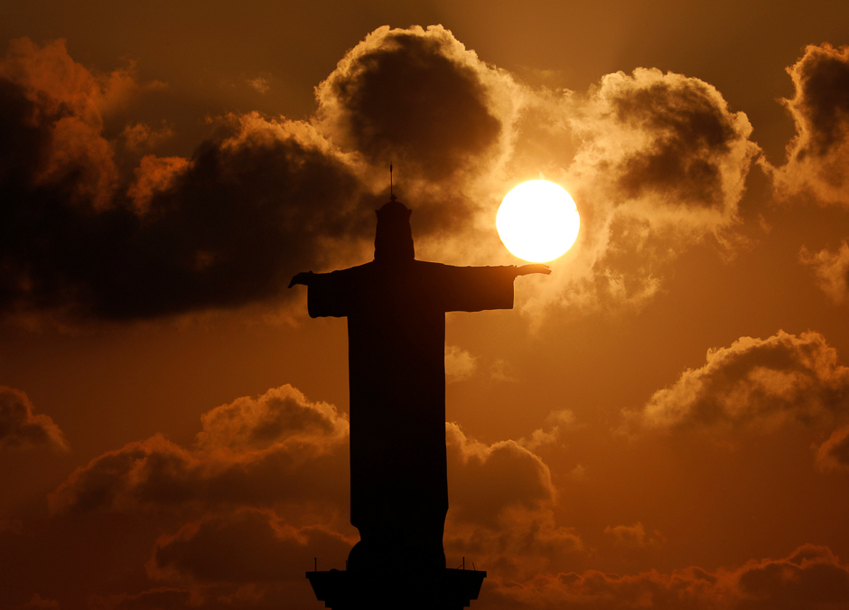 The statue of Christ the King is seen during sunset in Zouk Mosbeh in northern Beirut, Lebanon. PHOTO: REUTERS