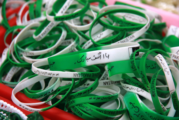 A stall full of wrist bands in green and white colour. PHOTOS: ATHAR KHAN/EXPRESS