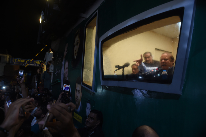 Ousted Pakistani prime minister Nawaz Sharif addresses a rally from his bullet-proof container in Rawalpindi on August 9, 2017. Deposed Pakistani prime minister Nawaz Sharif is leading a rally from the capital Islamabad to his home in Lahore, following his ouster by the Supreme Court following a corruption probe. PHOTO: AFP