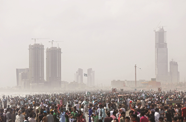 Citizens thronged the beach to witness the air show. PHOTO: Reuters