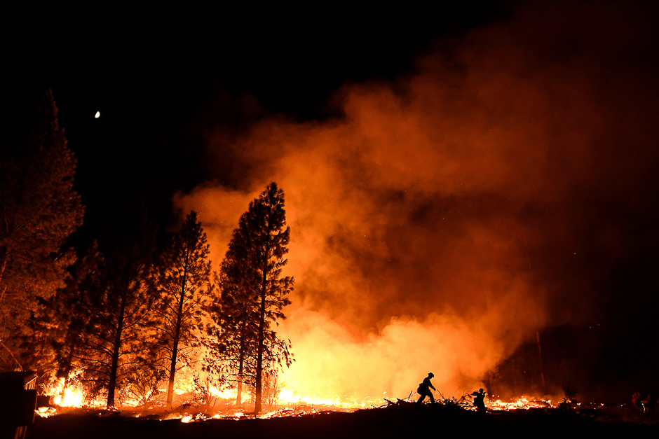 A firefighter battles the Ponderosa Fire east of Oroville, California, US. PHOTO: REUTERS