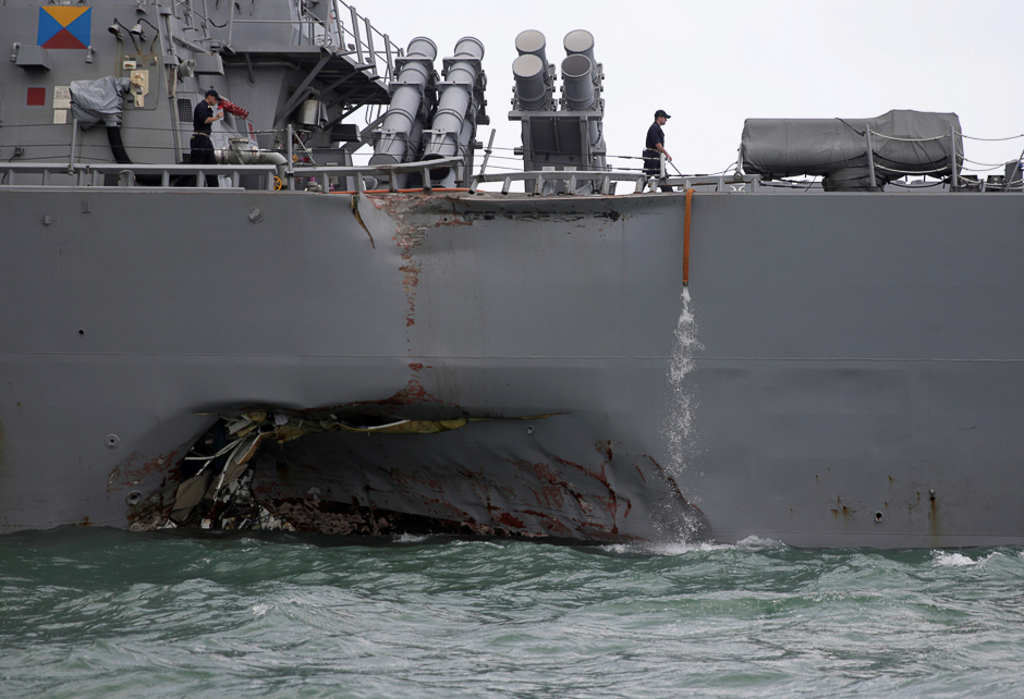 The US Navy guided-missile destroyer USS John S. McCain is seen after a collision, in Singapore waters. PHOTO: REUTERS