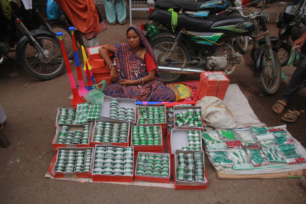 Clad in colourful sari, women from the Hindu community set up stalls at the Paper Market. 