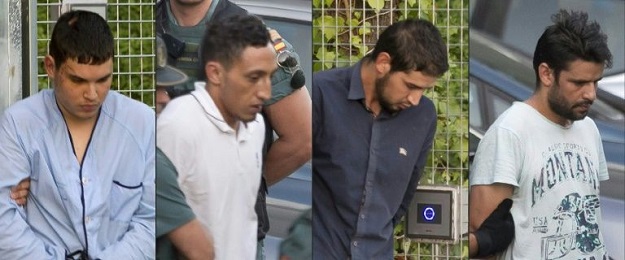 Mohamed Houli Chemlal, Driss Oukabir, Salah El Karib and Mohamed Aallaa were all charged with terrorism offences. PHOTO: AFP