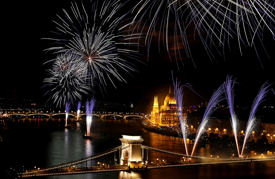 Fireworks explode over Danube river during celebrations of Saint Stephen's Day in Budapest, Hungary. PHOTO: REUTERS