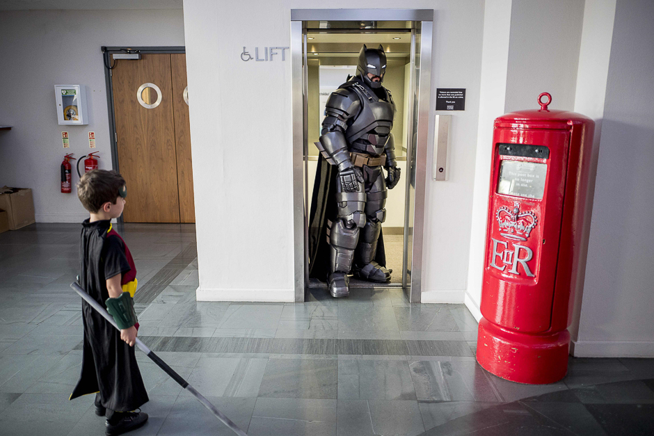 A cosplayer dressed as Batman comes out of a lift while attending London Super Comic Convention at Business Design Centre in Islington, London. PHOTO: AFP