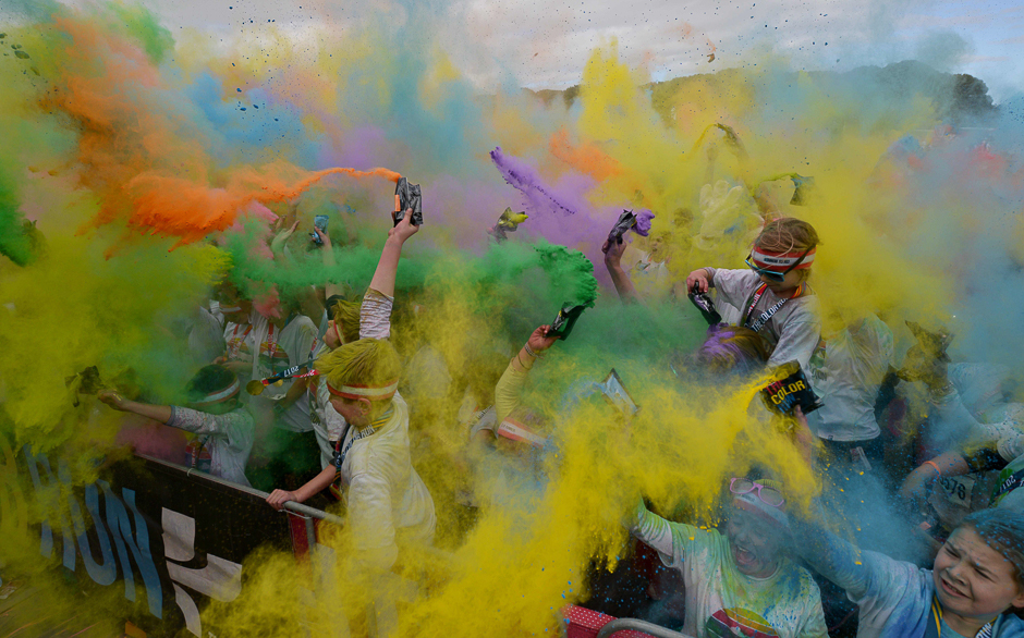 Runners participate in the annual Colour Run in Centennial Park in Sydney. PHOTO: AFP