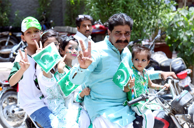 A family enjoys Independence Day in Hyderabad. PHOTO:PPI