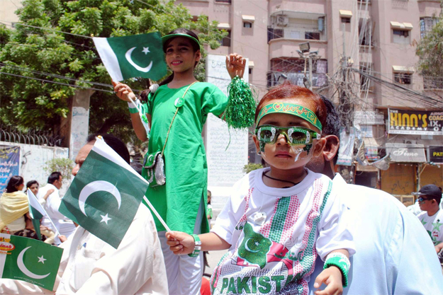 Children holding flags in Hyderabad to mark Independence Day. PHOTO:PPI