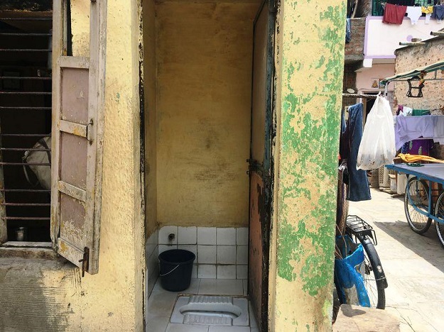 Homes in Jadibanagar slum, where a woman community leader trained by a local non-profit has overseen the upgrade of the settlement with water taps, toilets and paved lanes, and with a guarantee of no evictions for 10 years in Ahmedabad, India. June 21, 2017. Thomson Reuters Foundation/Rina Chandran