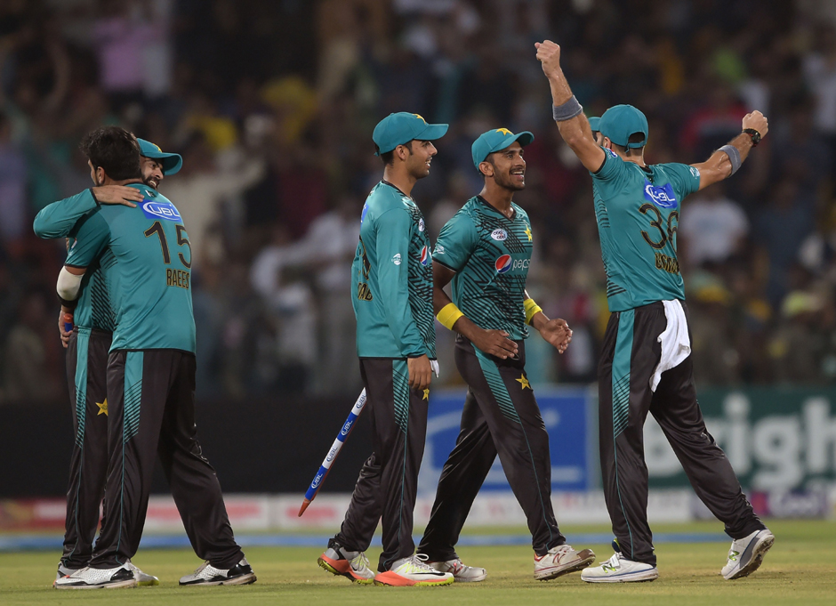 Pakistani cricketers celebrate after winning the third and final Twenty20 International match against World XI. PHOTO: AFP