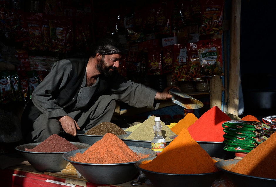 An Afghan vendor waits for customers for his spices at a roadside shop in Kabul. PHOTO: AFP