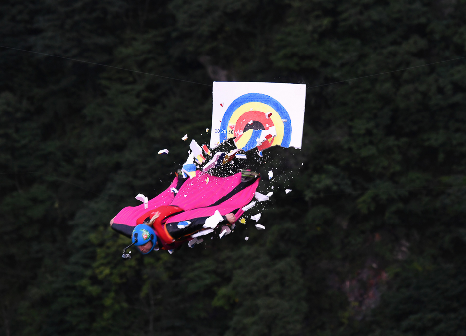 A wingsuit flyer hitting the target during the 6th Carabao World Wingsuit Championship on Tianmenshan mountain in Zhangjiajie in China's central Hunan province. PHOTO: AFP