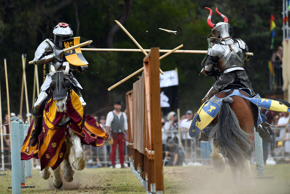 Per Estein Prois-Rohjell of Norway and Britain's Dominic Sewell (L) compete in the inaugural World Jousting Championship at the St Ives Medieval Faire in Sydney. PHOTO: AFP