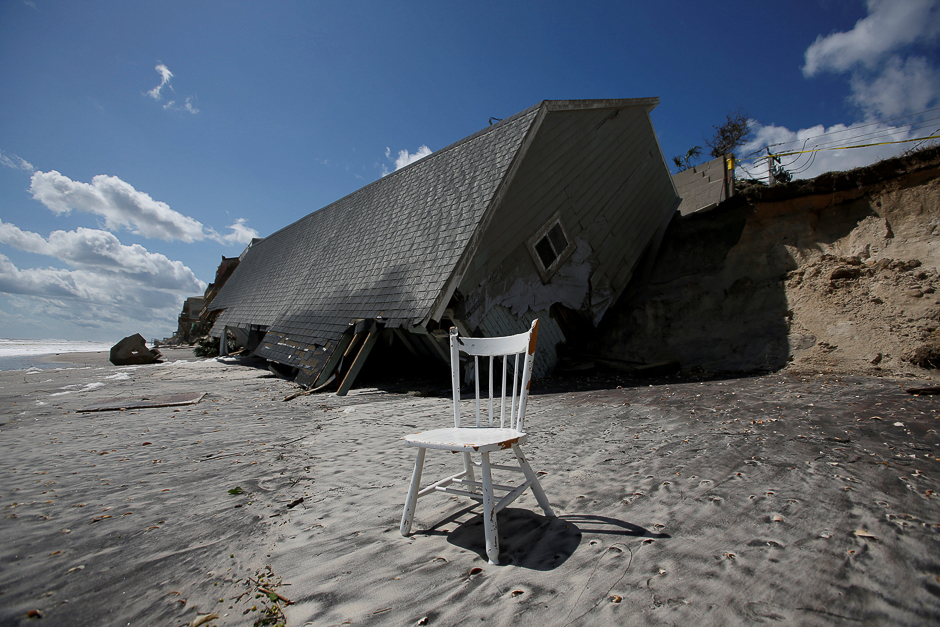 A chair is pictured outside a collapsed coastal house after Hurricane Irma passed the area in Vilano Beach, Florida, US. PHOTO: REUTERS