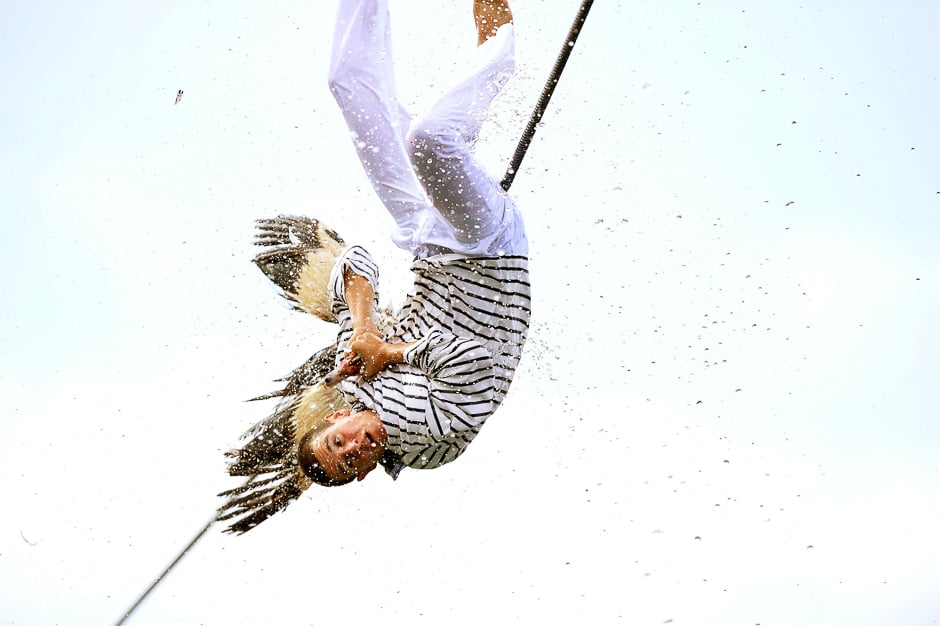 A man attempts to pull the neck off a dead goose while being repeatedly plunged into the water during Antzar Eguna (Day Of The Goose) in the Basque fishing town of Lekeitio, near Bilbao, Spain. PHOTO: REUTERS