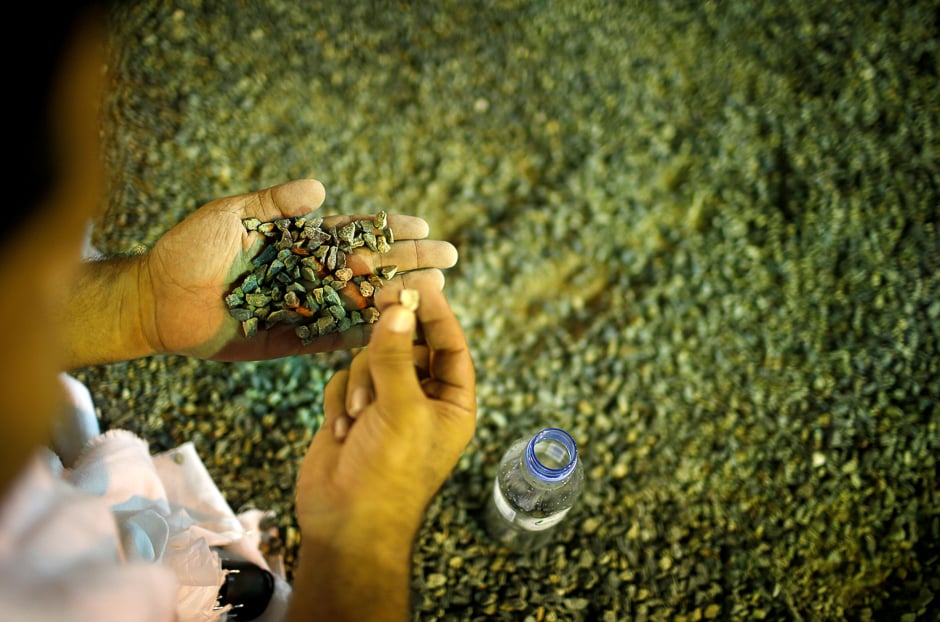 Pilgrims gather stones to be used to throw at marks symbolising Satan. PHOTO: REUTERS