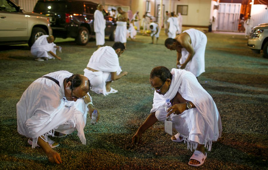 Pilgrims gather stones to be used to throw at marks symbolising Satan. PHOTO: REUTERS