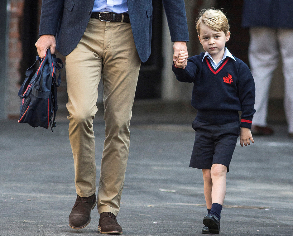 Britain's Prince William accompanies his son Prince George on his first day of school at Thomas's school in Battersea, London. PHOTO: REUTERS