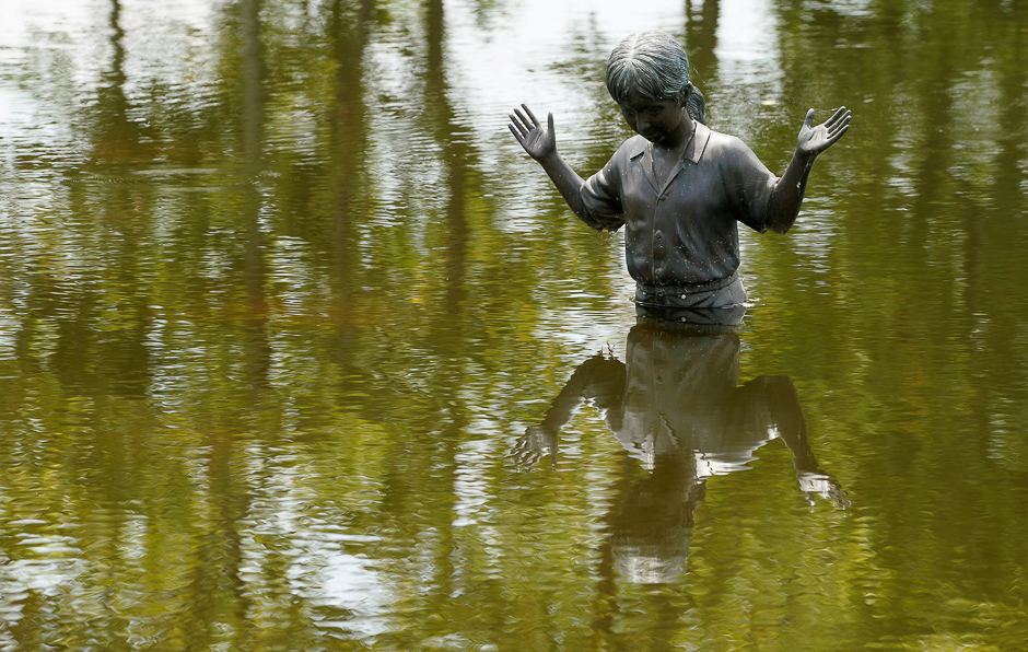 Statues of children are surrounded by Harvey floodwaters in southwestern Houston, Texas US. PHOTO: REUTERS