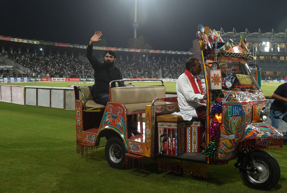 Misbah waves to the crowd as he takes a lap of honour during the last match. PHOTO: AFP