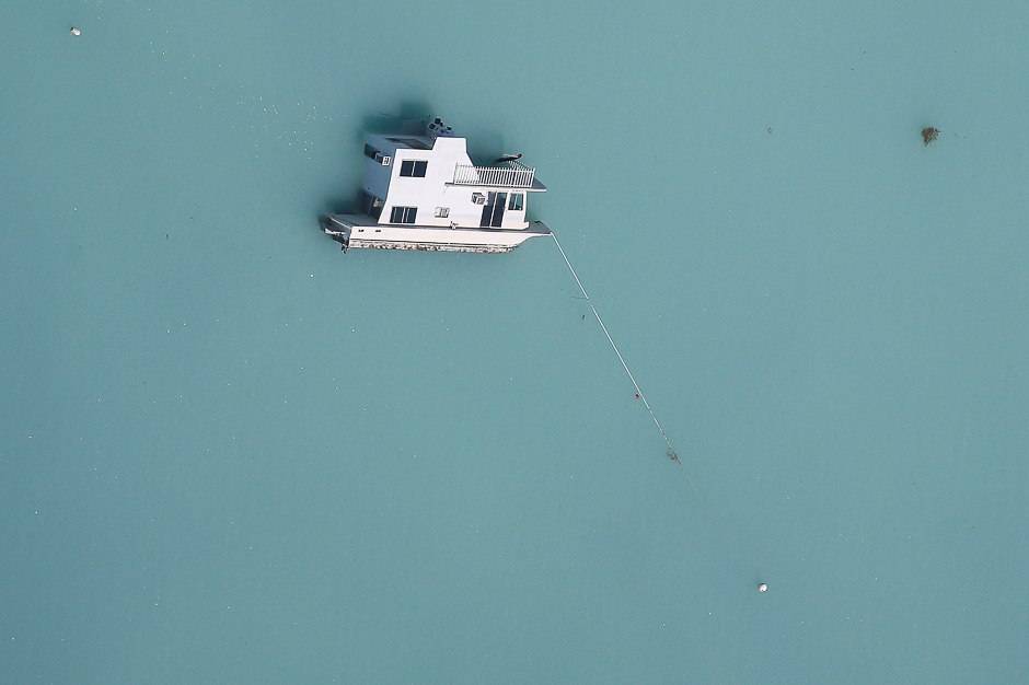 A sunken boat is pictured in an aerial photo in the Keys in Marathon, Florida, US. PHOTO: REUTERS