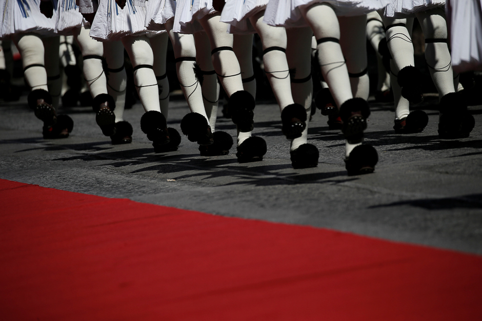 Greek Presidential Guards perform during a welcome ceremony for French President in Athens, Greece. PHOTO; REUTERS