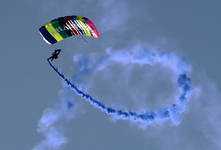 A paratrooper performs during a ceremony to mark the country's Defence Day in Peshawar, Pakistan. PHOTO: AFP