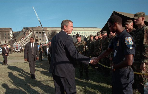 President George W. Bush greets rescue workers, firefighters and military personnel. PHOTO: George W. Bush Presidential Library
