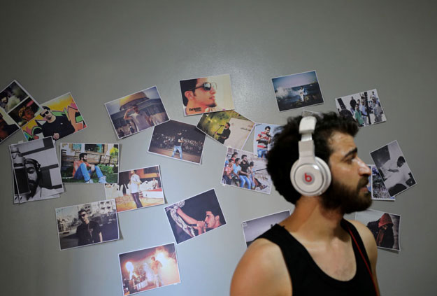 Palestinian rapper Ibrahim Ghunaim (MC Gaza) practices his songs in his room, at home in Gaza City, August 24, 2017. PHOTO: REUTERS