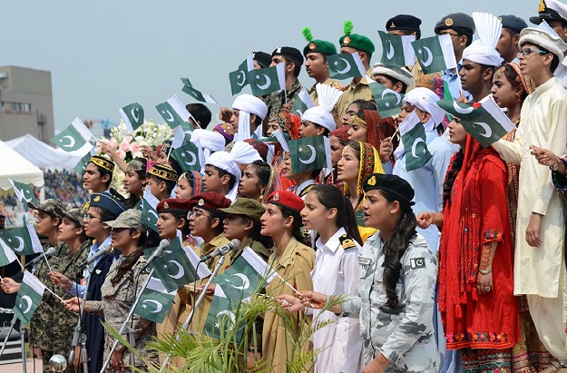Children presenting national songs during an event to mark the Defence Day at Fortress Stadium in Lahore. PHOTO: APP