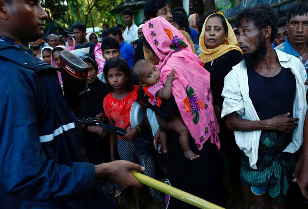 At least 430,000 Rohingya have fled into neighbouring Bangladesh. PHOTO: REUTERS 