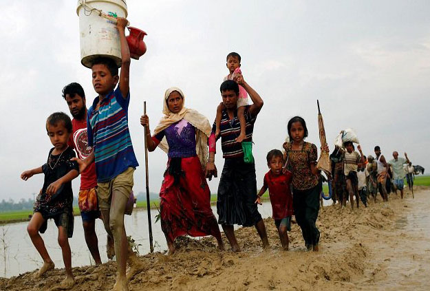 At least 430,000 Rohingya have fled into neighbouring Bangladesh. PHOTO: REUTERS