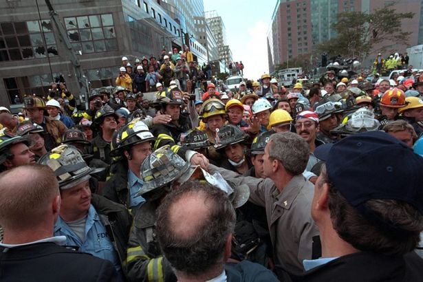 The president greets firefighters, police and rescue personnel, Sept. 14, 2001. PHOTO: George W. Bush Presidential Library