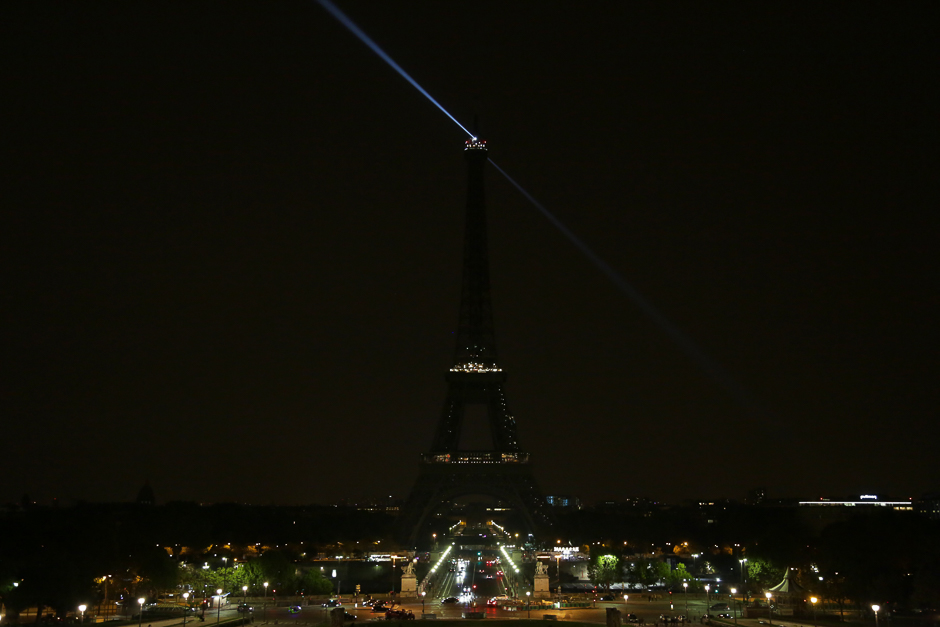 The lights of the Eiffel Tower in the French capital Paris are switched off on in homage to the victims of an attack two days ago in the Somali capital Mogadishu in which at least 276 people were killed and 300 injured. PHOTO: AFP