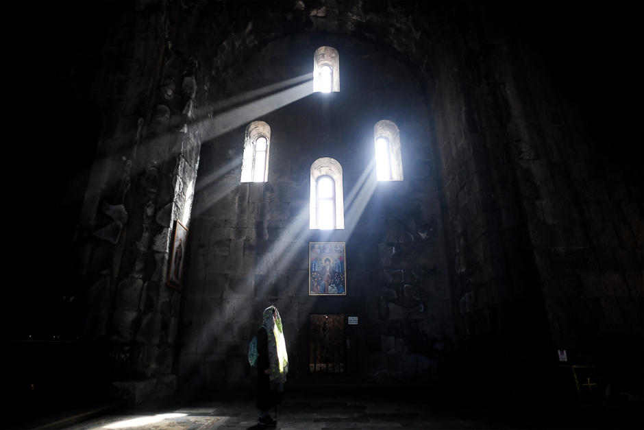 A woman prays in the Sts. Paul and Peter church at the 9th century Tatev monastery of the Armenian Apostolic Church some 270 km of Yerevan. PHOTO: AFP