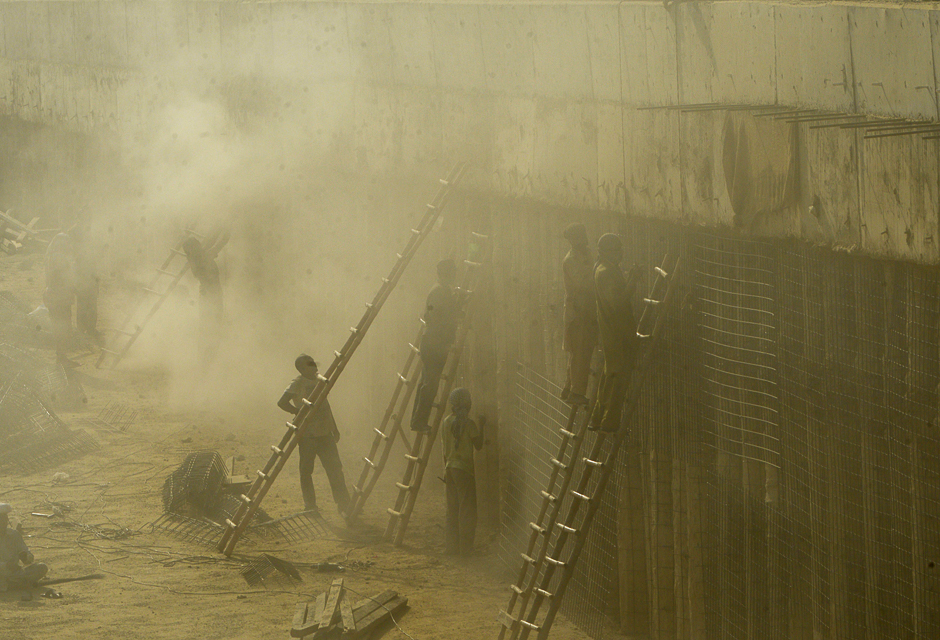 A Pakistani labourer works on a contruction site in Lahore. PHOTO: AFP