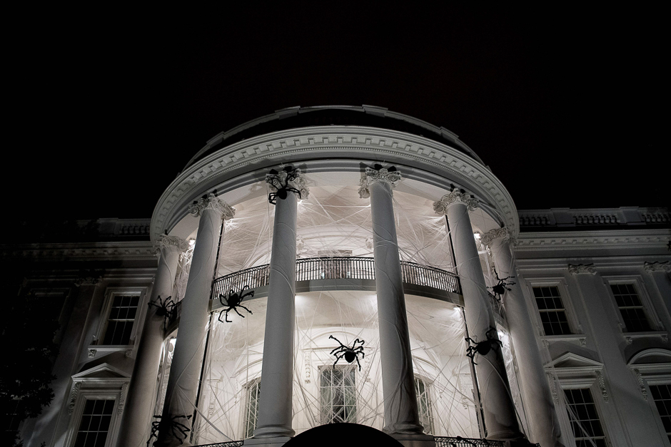 Spiders are seen decorating the White House for Halloween in Washington, DC. PHOTO: AFP