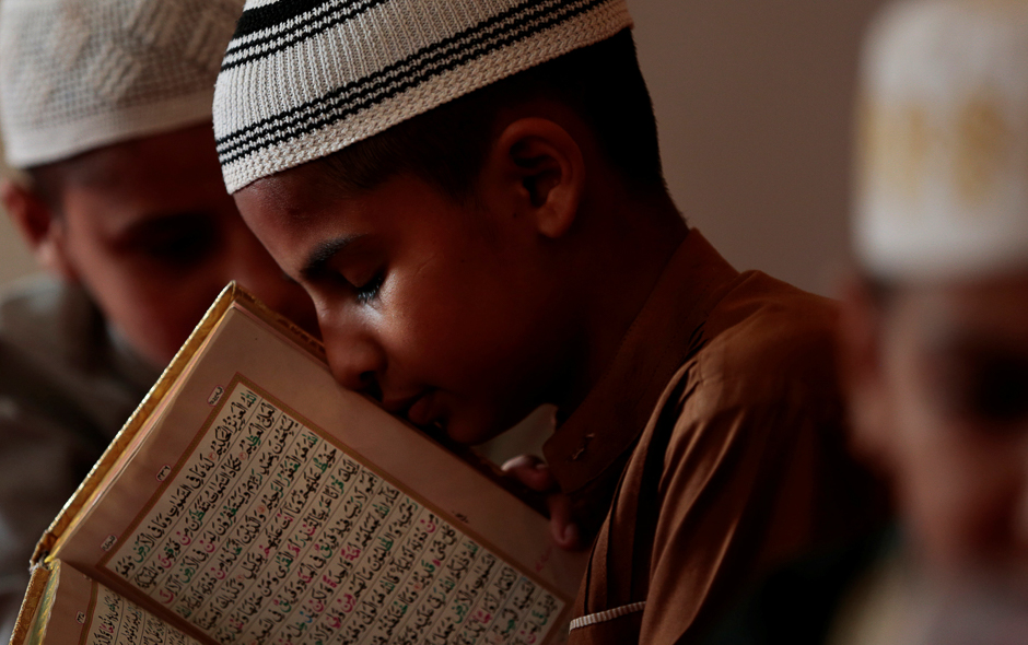 A student memorises the Quran at a madrassa in Murree, Pakistan. PHOTO: REUTERS